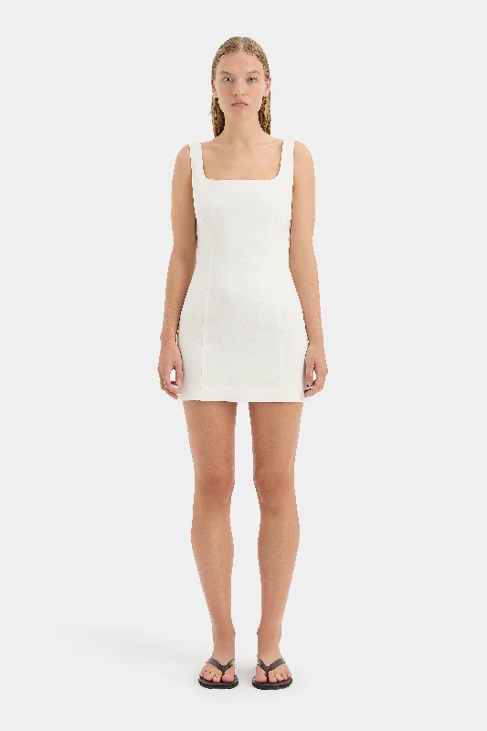 Timeless clothing pieces every woman should own   Iris Tie Mini Dress