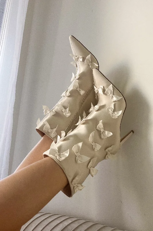 Bold and sophisticated looks for every woman   Azalea Wang Taf Cream Satin Bow Stiletto Booties