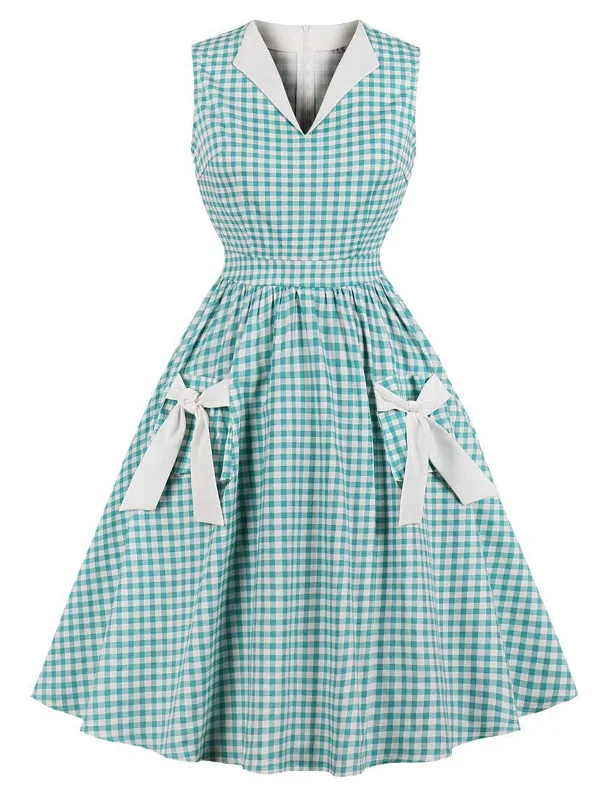Refresh your wardrobe with high-quality women’s fashion   1950s Plaid Bow Pockets Lapel Dress
